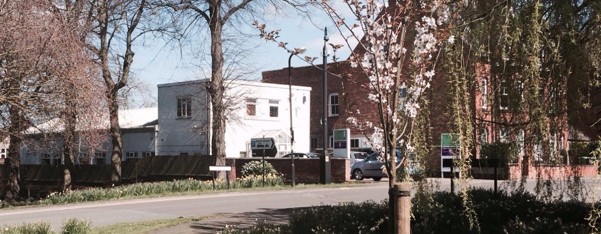 The practice building on Regent Place, Rugby, seen from across the road in spring.